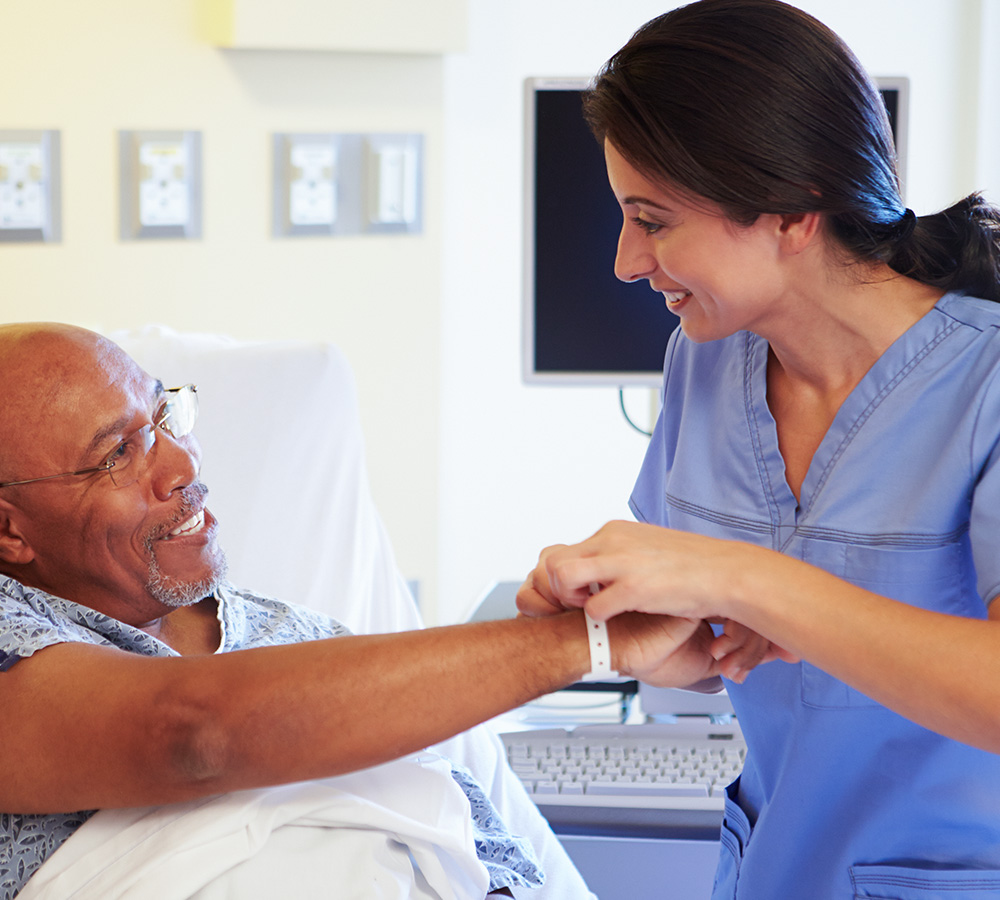 a nurse assisting a patient