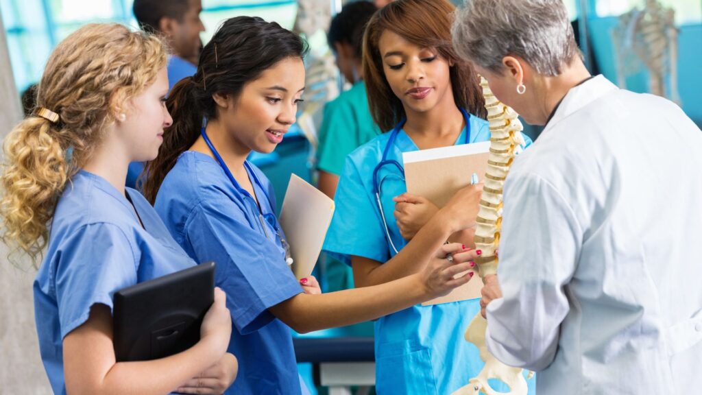 Group of nursing students learning