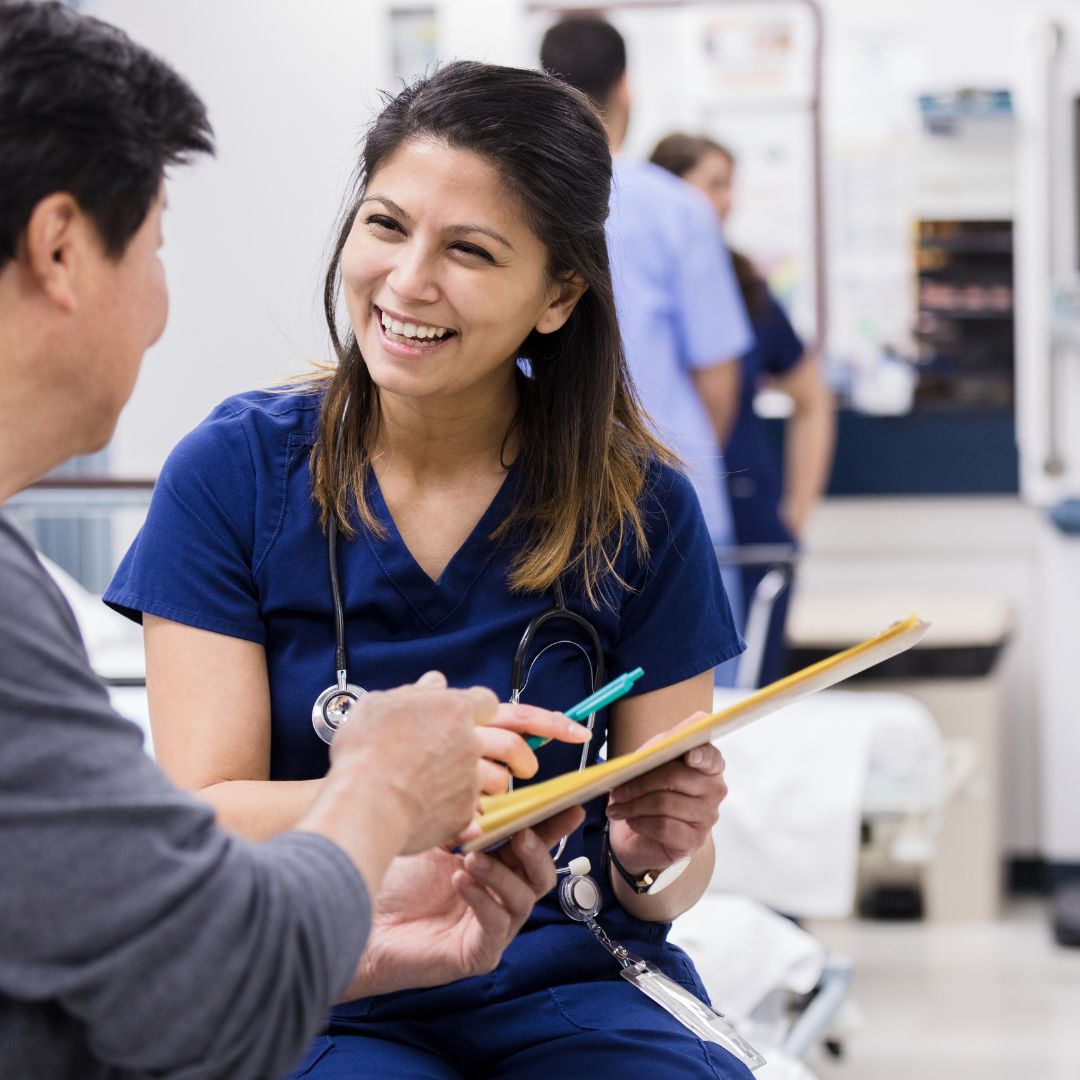 Nurse speaking with patient