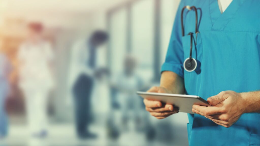 nurse holding tablet