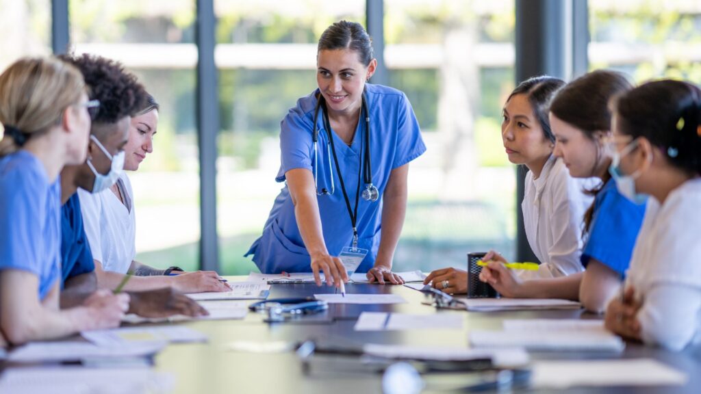 nurse in a round table meeting