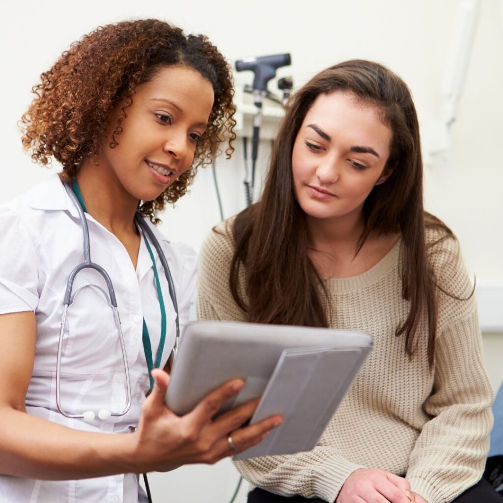 nurse and patient talking