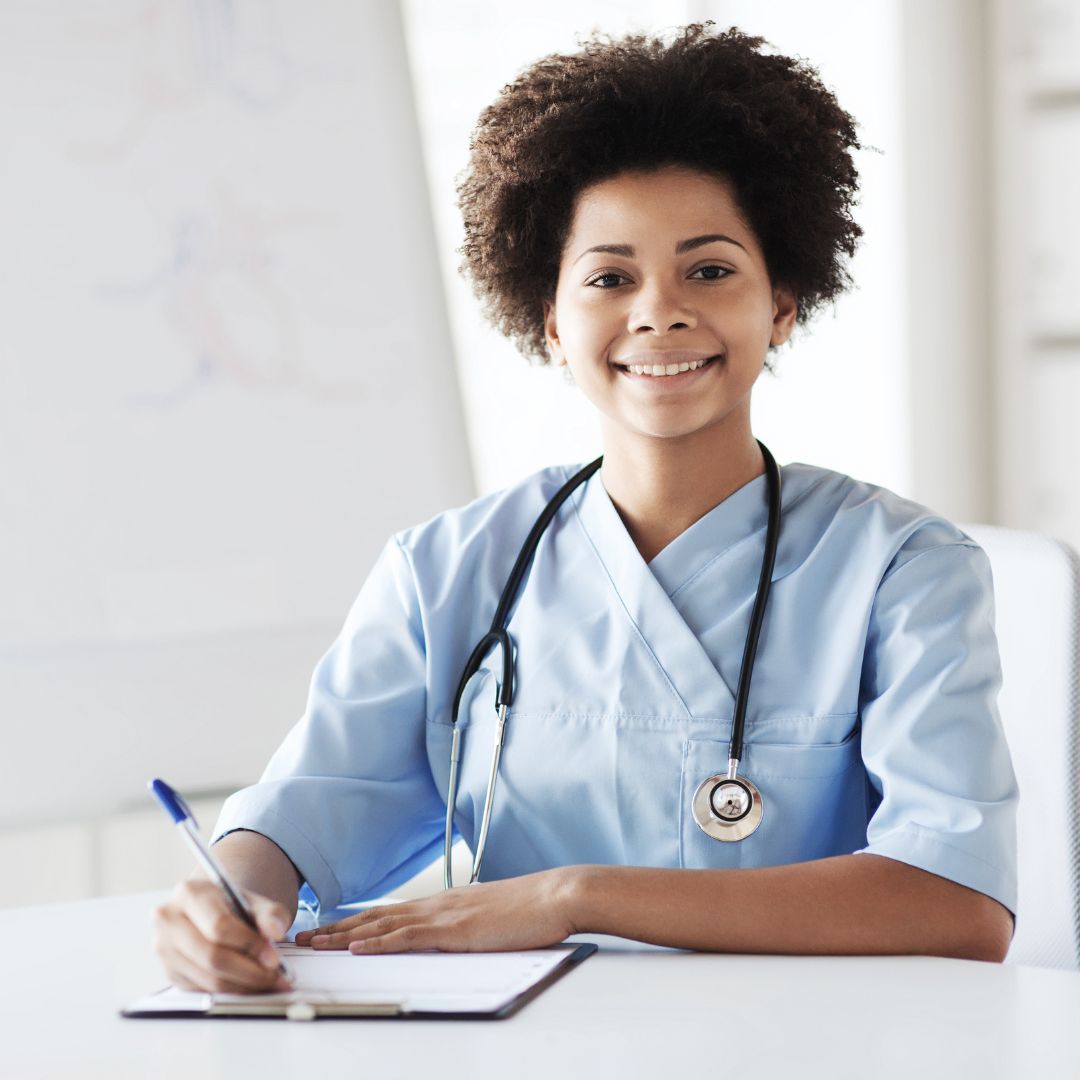 nursing student sitting and taking notes