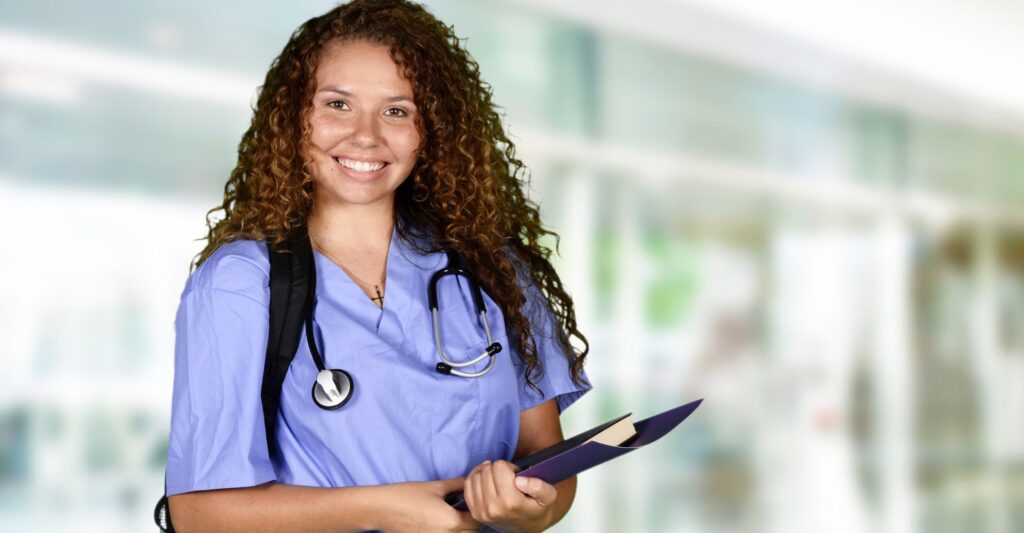 nursing student with binder