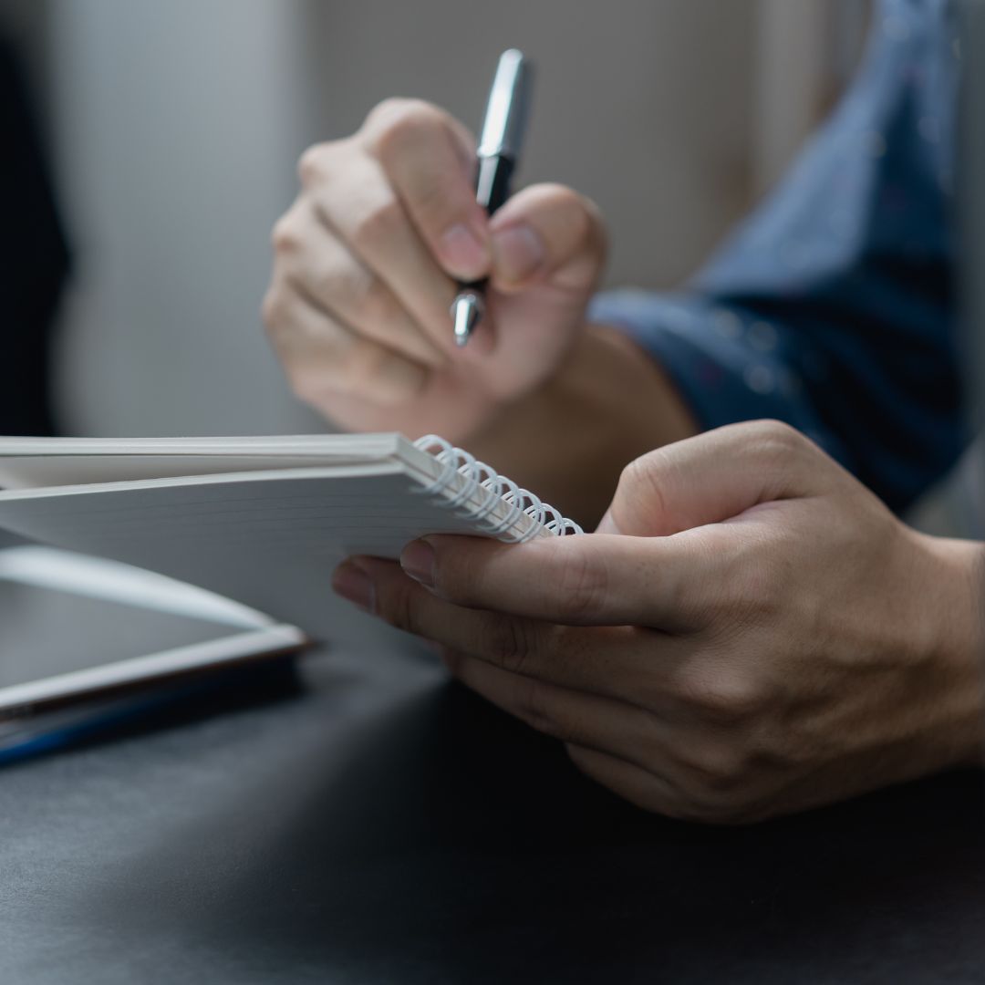 writing in notebook