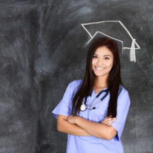 Nurse with graduation cap chalked above her head
