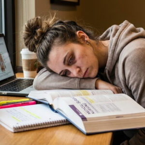 tired nursing student studying
