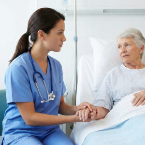 LPN listens intently to an elderly patient