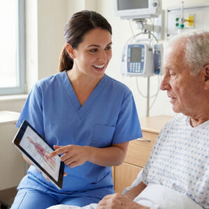 patient care technician holding a tablet and explaining a medical procedure to a patient